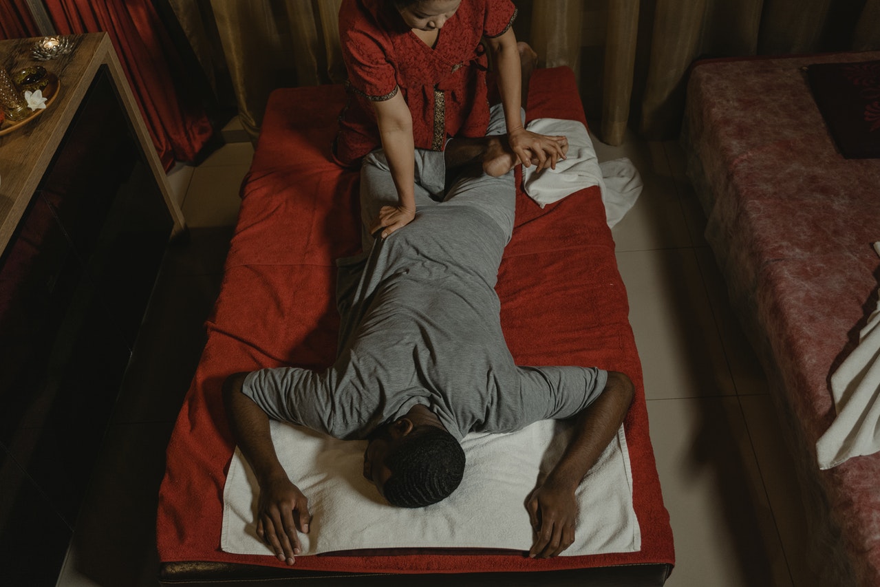 man getting thai massage